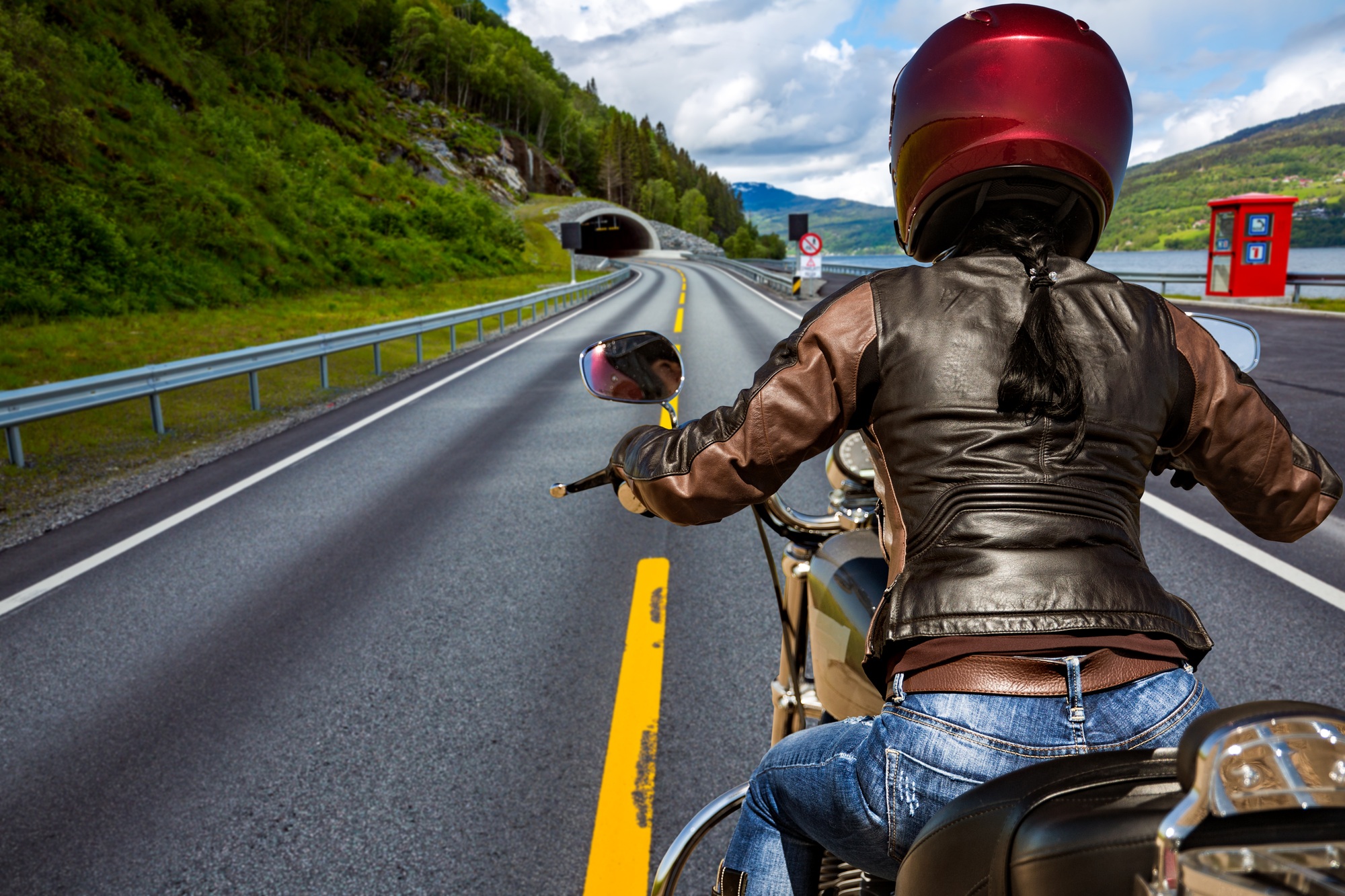 Biker girl First-person view, mountain serpentine.
